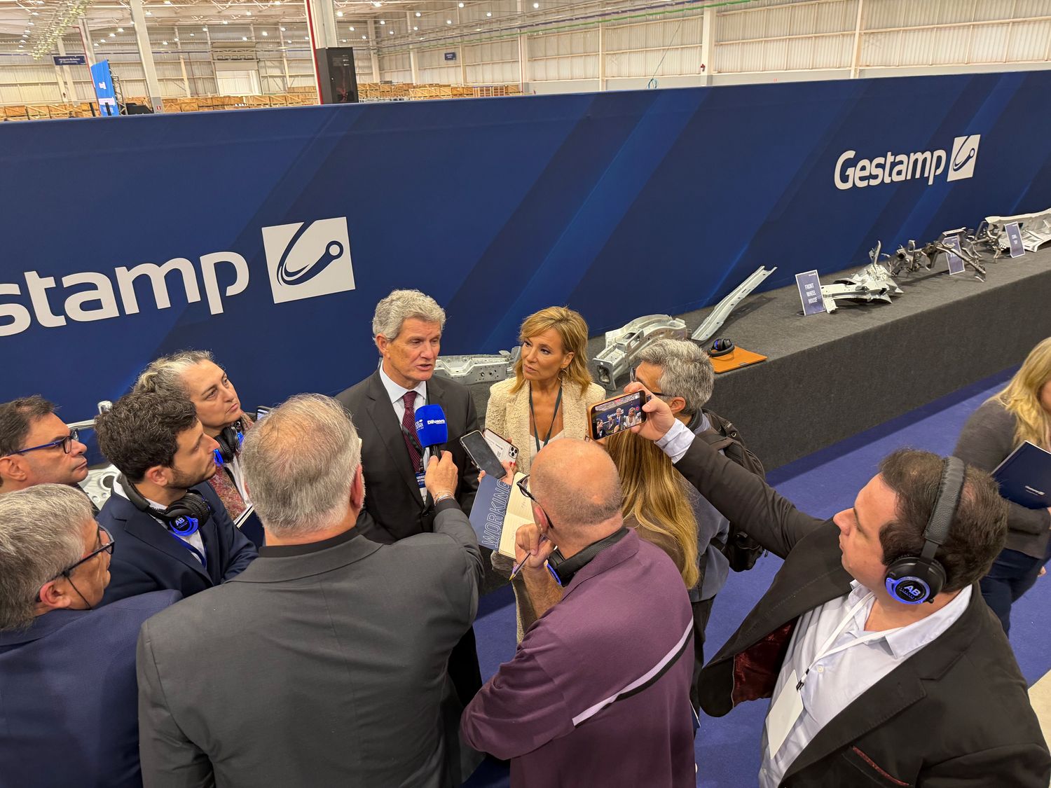 Interview beside automotive parts at the Gestamp plant
